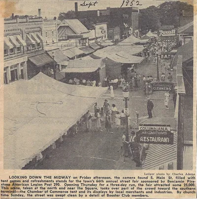 HIstorical looking photo of street fair